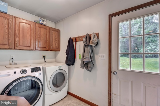 2744 Church Ln, Taneytown, MD 21787 - laundry room with independent washer and dryer, cabinet space, and light tile patterned flooring