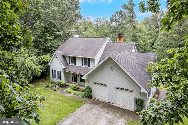 2744 Church Ln, Taneytown, MD 21787 - view of front facade featuring a shingled roof, driveway, an attached garage, a front yard, and a porch