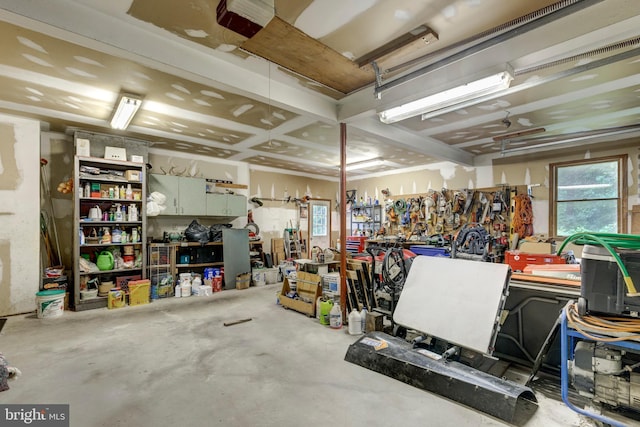 2744 Church Ln, Taneytown, MD 21787 - garage featuring a garage door opener and a workshop area