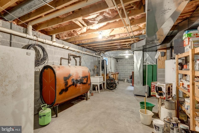 2744 Church Ln, Taneytown, MD 21787 - unfinished basement featuring oil tank, heating unit, and gas water heater