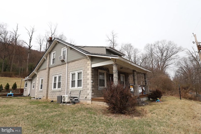 138 Seyfert Dr, Birdsboro, PA 19508 - view of side of home with a porch, a yard, and cooling unit