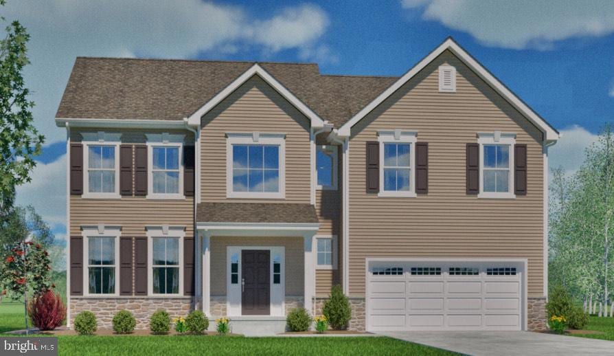 view of front facade with stone siding, concrete driveway, and an attached garage