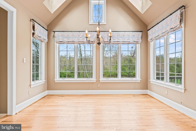 607 Newtown Rd, Berwyn, PA 19312 - unfurnished sunroom featuring a skylight, a notable chandelier, and a healthy amount of sunlight