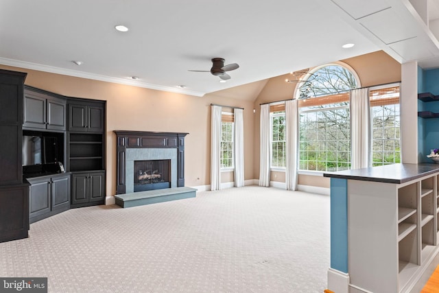 607 Newtown Rd, Berwyn, PA 19312 - unfurnished living room with light colored carpet, a fireplace, a ceiling fan, baseboards, and ornamental molding