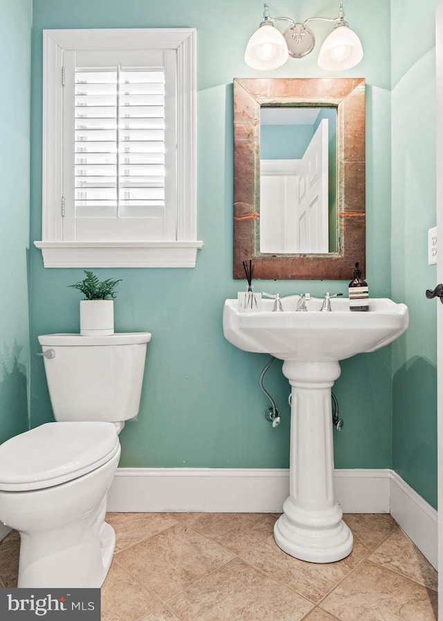 607 Newtown Rd, Berwyn, PA 19312 - bathroom featuring tile patterned flooring, baseboards, and toilet