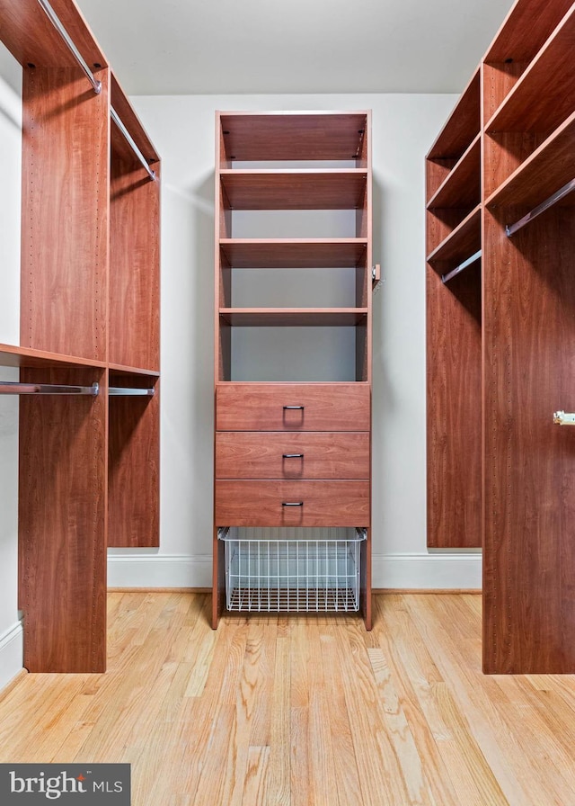 607 Newtown Rd, Berwyn, PA 19312 - spacious closet with wood finished floors