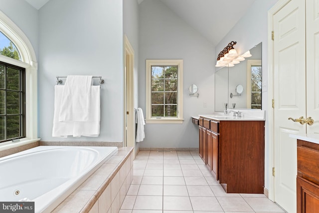 607 Newtown Rd, Berwyn, PA 19312 - full bathroom featuring a whirlpool tub, tile patterned floors, high vaulted ceiling, and vanity