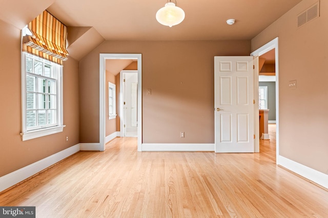 607 Newtown Rd, Berwyn, PA 19312 - empty room with baseboards, visible vents, and light wood finished floors