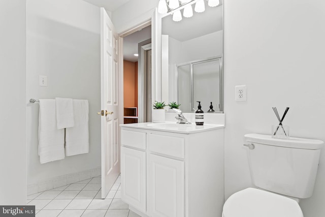 607 Newtown Rd, Berwyn, PA 19312 - full bath with vanity, toilet, tile patterned floors, baseboards, and a shower stall