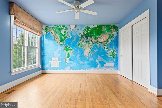 607 Newtown Rd, Berwyn, PA 19312 - interior space featuring a ceiling fan, visible vents, wood finished floors, baseboards, and wallpapered walls