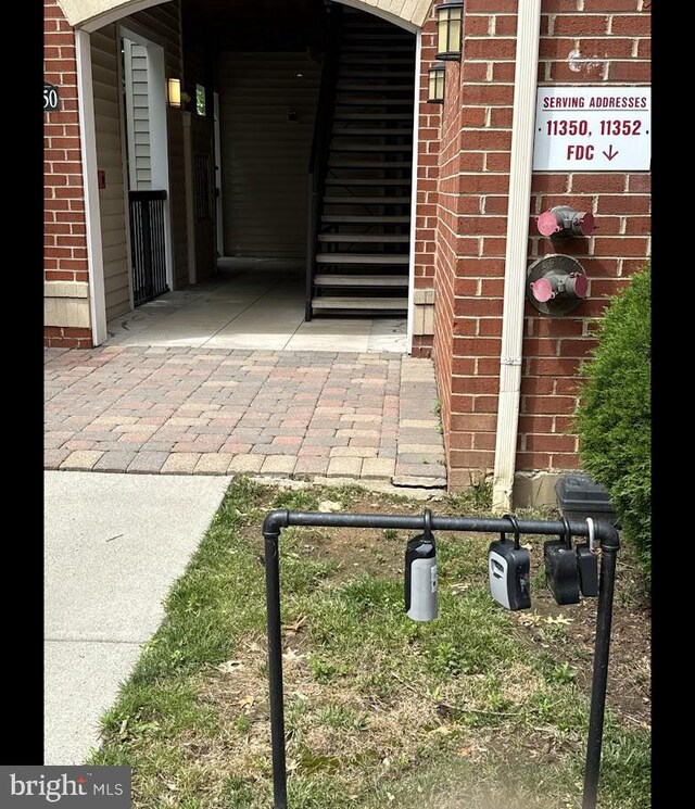 11355 Aristotle Dr Unit 213, Fairfax, VA 22030 - entrance to property with brick siding