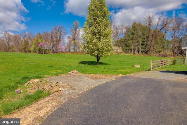 view of yard with fence