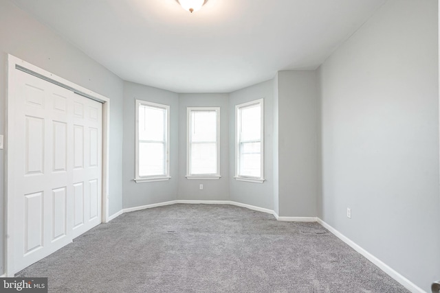 836 State St, Camden, NJ 08102 - unfurnished bedroom featuring baseboards, a closet, and carpet