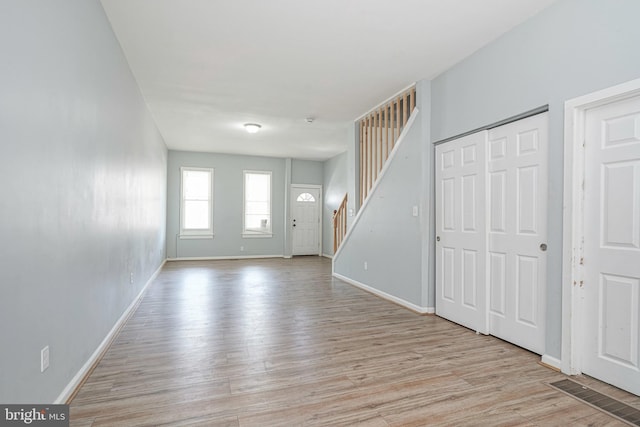 836 State St, Camden, NJ 08102 - entrance foyer with stairway, baseboards, and light wood-style flooring