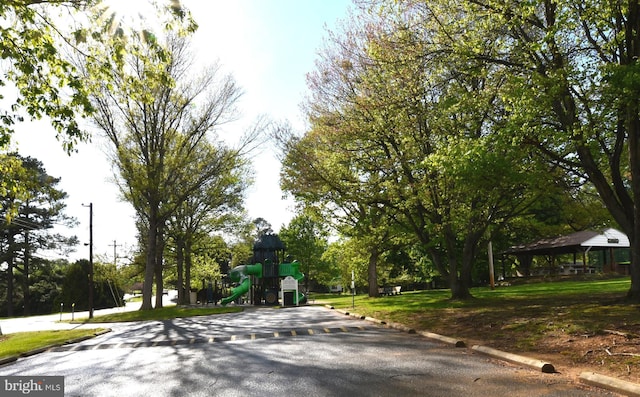view of property's community with a gazebo and playground community