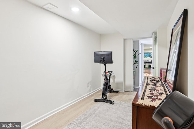 7836 Heritage Dr, Annandale, VA 22003 - workout room with light wood finished floors, baseboards, and recessed lighting