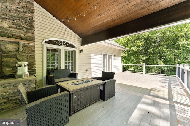 6707 Burch Hill Rd, Brandywine, MD 20613 - deck featuring an outdoor fire pit and french doors