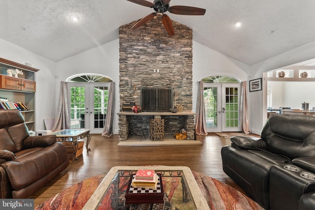 6707 Burch Hill Rd, Brandywine, MD 20613 - living area with french doors, a textured ceiling, ceiling fan, high vaulted ceiling, and hardwood / wood-style floors
