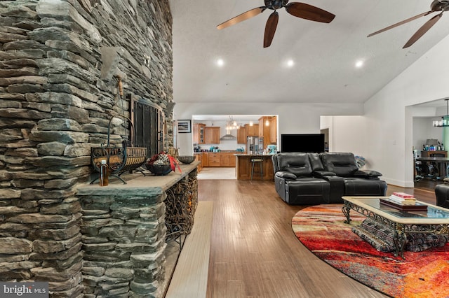 6707 Burch Hill Rd, Brandywine, MD 20613 - living area with ceiling fan, high vaulted ceiling, wood finished floors, and recessed lighting