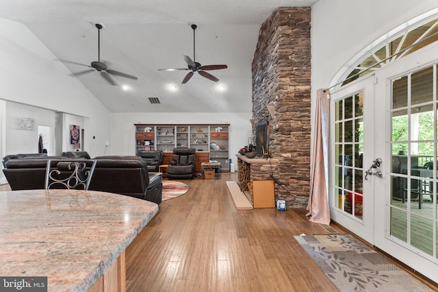 6707 Burch Hill Rd, Brandywine, MD 20613 - living room with high vaulted ceiling, wood-type flooring, french doors, a ceiling fan, and recessed lighting