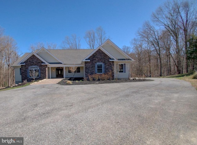 6707 Burch Hill Rd, Brandywine, MD 20613 - view of front of home featuring stone siding and a porch