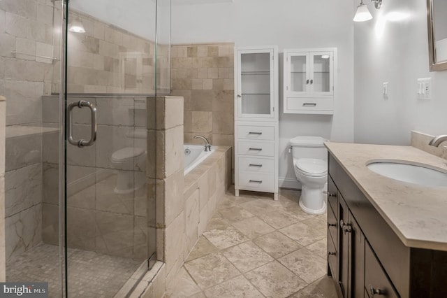 1319 Euclid St NW Unit 3, Washington, DC 20009 - bathroom with toilet, a stall shower, a bath, and vanity