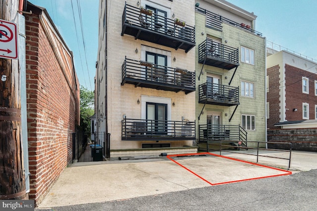 1319 Euclid St NW Unit 3, Washington, DC 20009 - view of building exterior with uncovered parking
