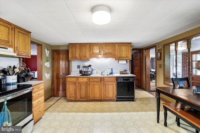 kitchen featuring black dishwasher, electric range, brown cabinets, and light floors