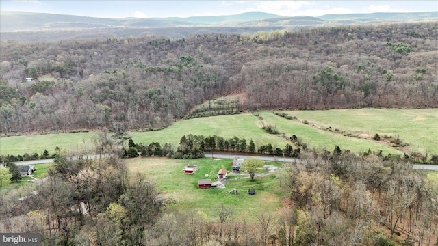 bird's eye view with a forest view, a mountain view, and a rural view