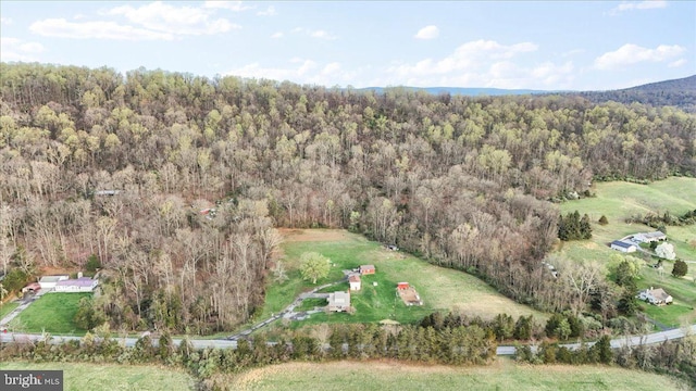 aerial view featuring a view of trees