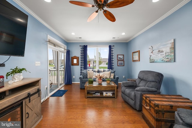 105 Cresthaven Ln, Dover, DE 19901 - living room with recessed lighting, crown molding, ceiling fan, wood finished floors, and baseboards