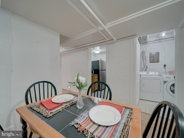 1234 Monroe St NE, Washington, DC 20017 - dining area featuring washing machine and dryer
