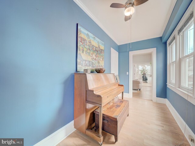 1234 Monroe St NE, Washington, DC 20017 - sitting room with crown molding, light wood finished floors, baseboards, and a ceiling fan