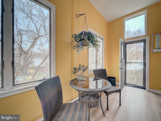 1234 Monroe St NE, Washington, DC 20017 - dining room featuring baseboards, wood finished floors, and a healthy amount of sunlight