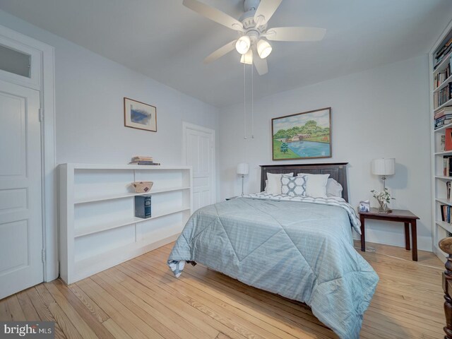 1234 Monroe St NE, Washington, DC 20017 - bedroom with wood-type flooring and ceiling fan