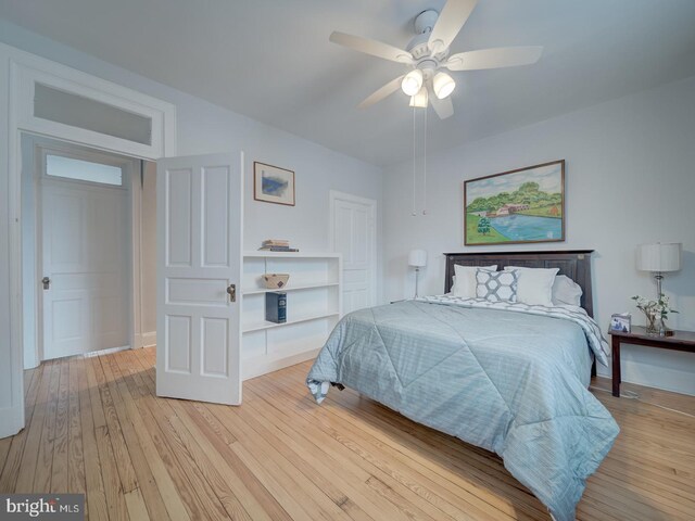 1234 Monroe St NE, Washington, DC 20017 - bedroom with light wood-style flooring and ceiling fan