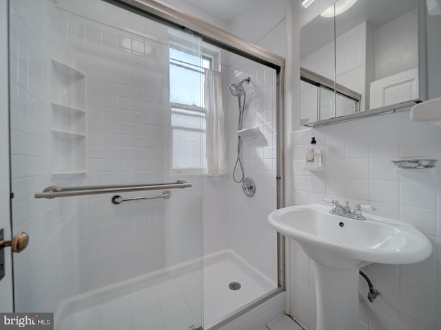1234 Monroe St NE, Washington, DC 20017 - full bath featuring a shower stall and tile walls