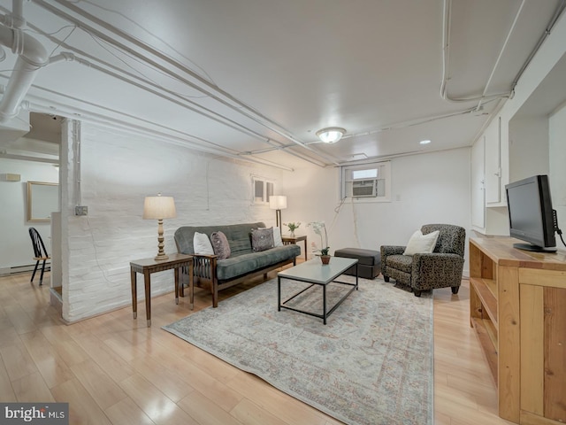 1234 Monroe St NE, Washington, DC 20017 - living area featuring light wood finished floors, baseboard heating, and cooling unit