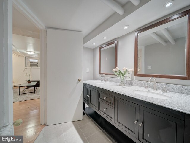 1234 Monroe St NE, Washington, DC 20017 - full bathroom with double vanity, a sink, beam ceiling, and recessed lighting