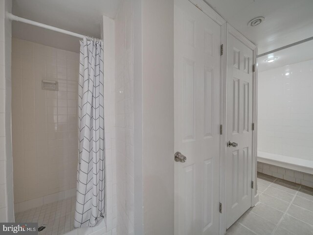 1234 Monroe St NE, Washington, DC 20017 - full bath featuring a shower stall and tile patterned flooring