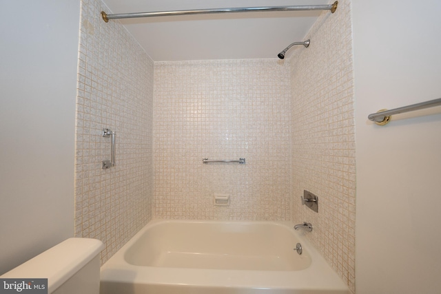 full bathroom featuring bathtub / shower combination and toilet