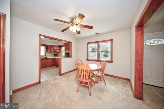 407 Wilgis Rd, Fallston, MD 21047 - dining space featuring light colored carpet, plenty of natural light, and baseboards