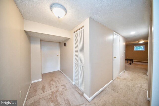 407 Wilgis Rd, Fallston, MD 21047 - hallway with carpet, a textured ceiling, and baseboards