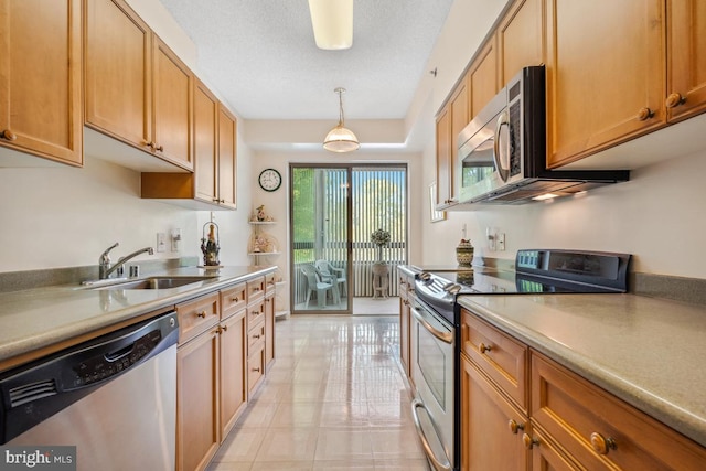 2901 S Leisure World Blvd Unit 133, Silver Spring, MD 20906 - kitchen featuring stainless steel appliances, a sink, hanging light fixtures, light countertops, and light tile patterned floors