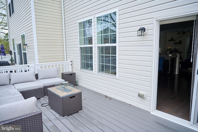 deck with an outdoor hangout area