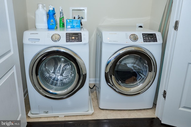 laundry area with washer and dryer and laundry area