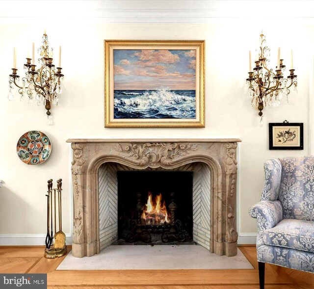 interior details featuring baseboards and a fireplace