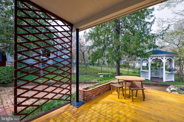 27 Ridge Rd, Greenbelt, MD 20770 - wooden deck featuring a gazebo, outdoor dining area, and fence
