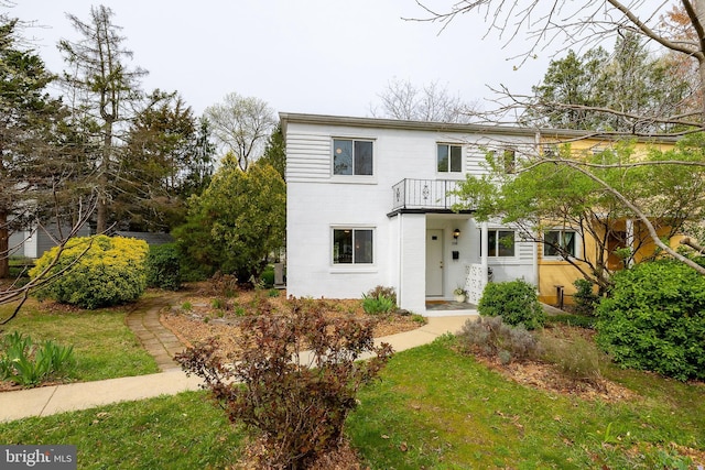 27 Ridge Rd, Greenbelt, MD 20770 - view of front of property featuring a front yard and a balcony