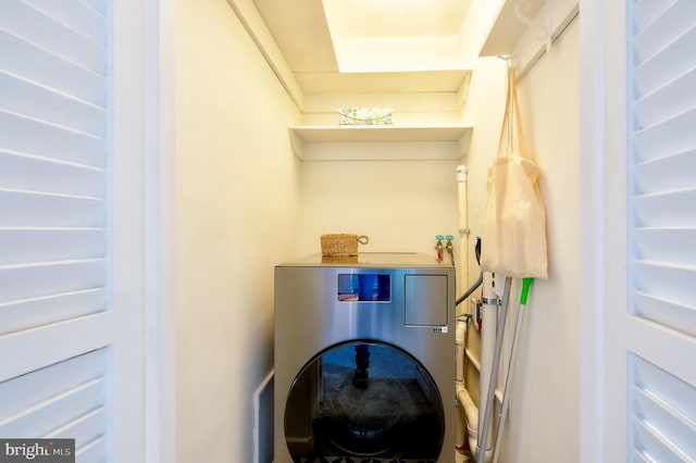 27 Ridge Rd, Greenbelt, MD 20770 - clothes washing area featuring washer / clothes dryer and laundry area